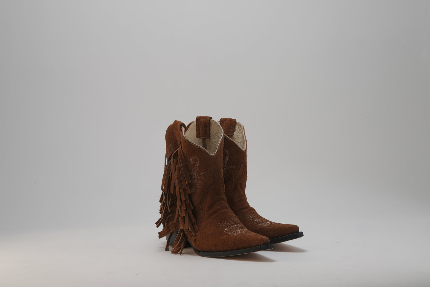 Jornada Pony Ankle Boots with Fringes