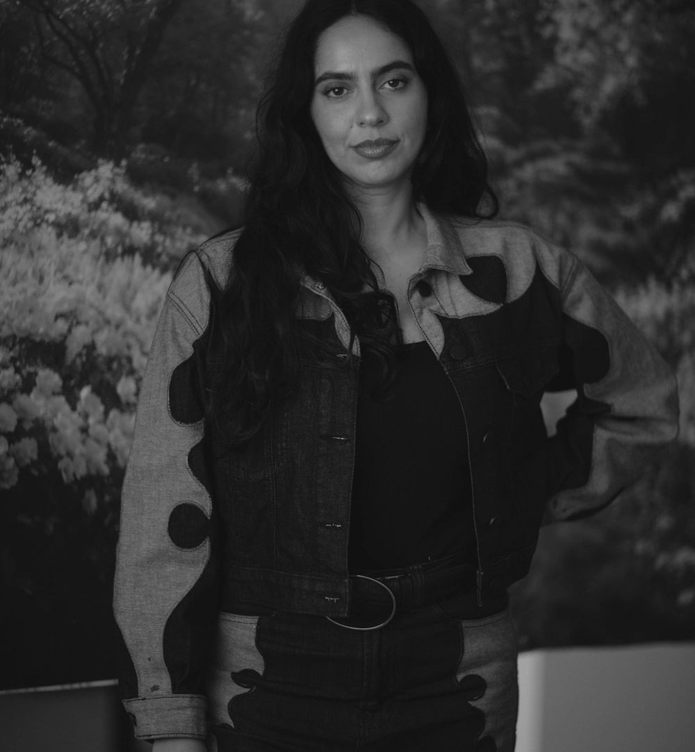 Montserrat Messeguer in a denim jacket, in black and white