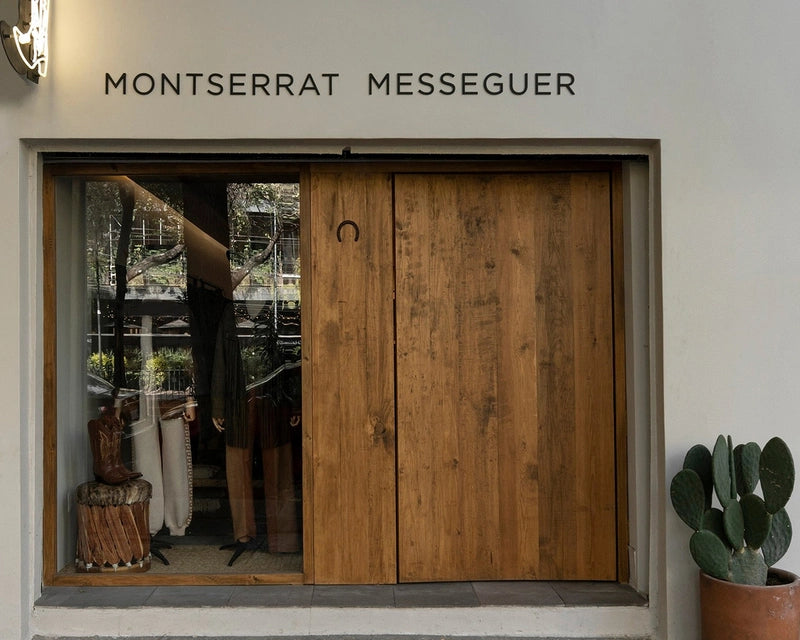 Montserrat Messeguer storefront with wooden doors