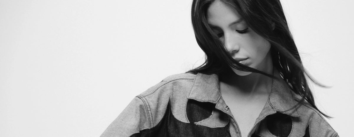 Woman in a denim shirt, in black and white