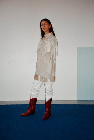 Cream-colored leather camisole with oyster-colored details.
